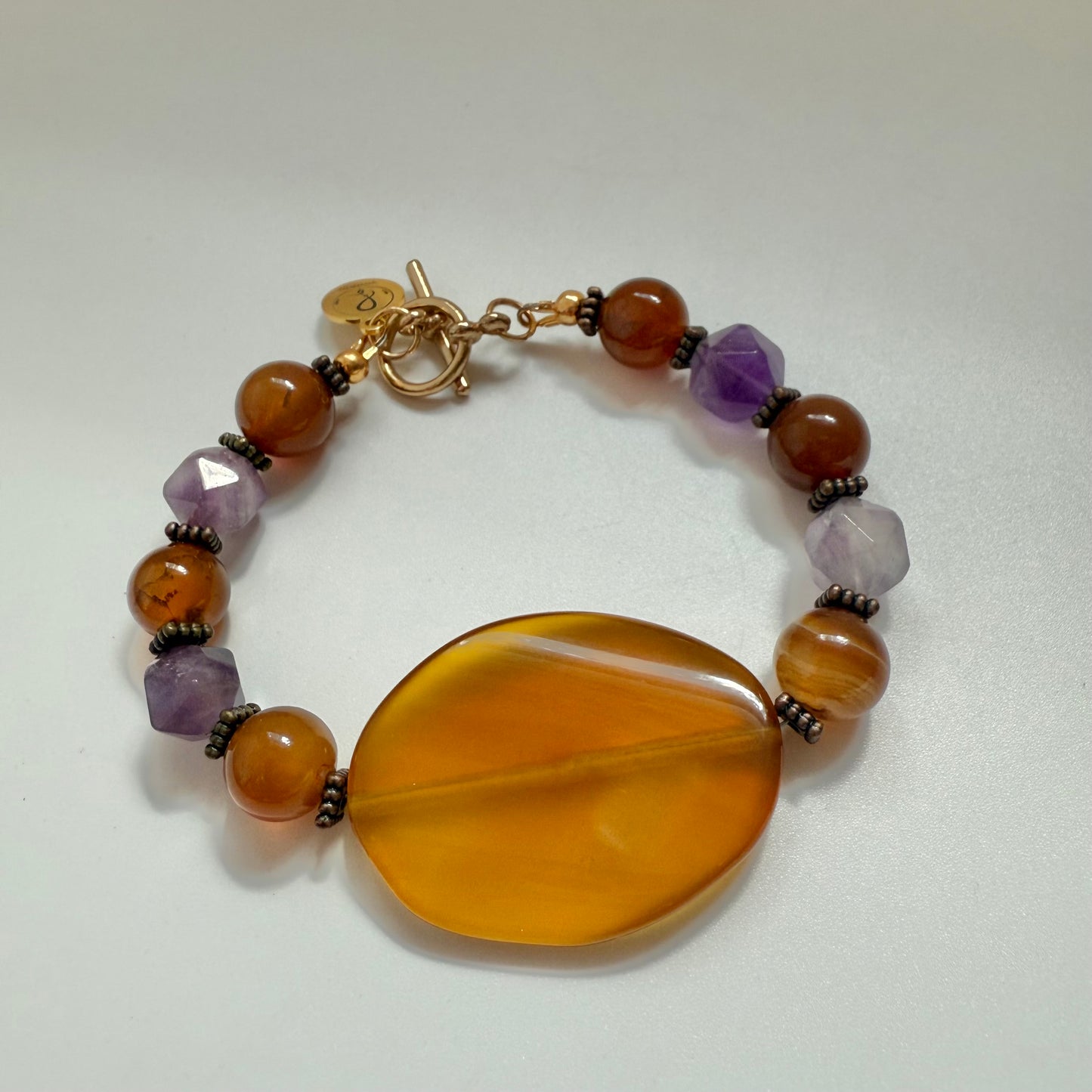 Soul Fusion” – Carnelian & Amethyst Statement Bracelet